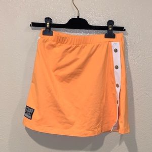 Illustrated people orange and white wrap skirt